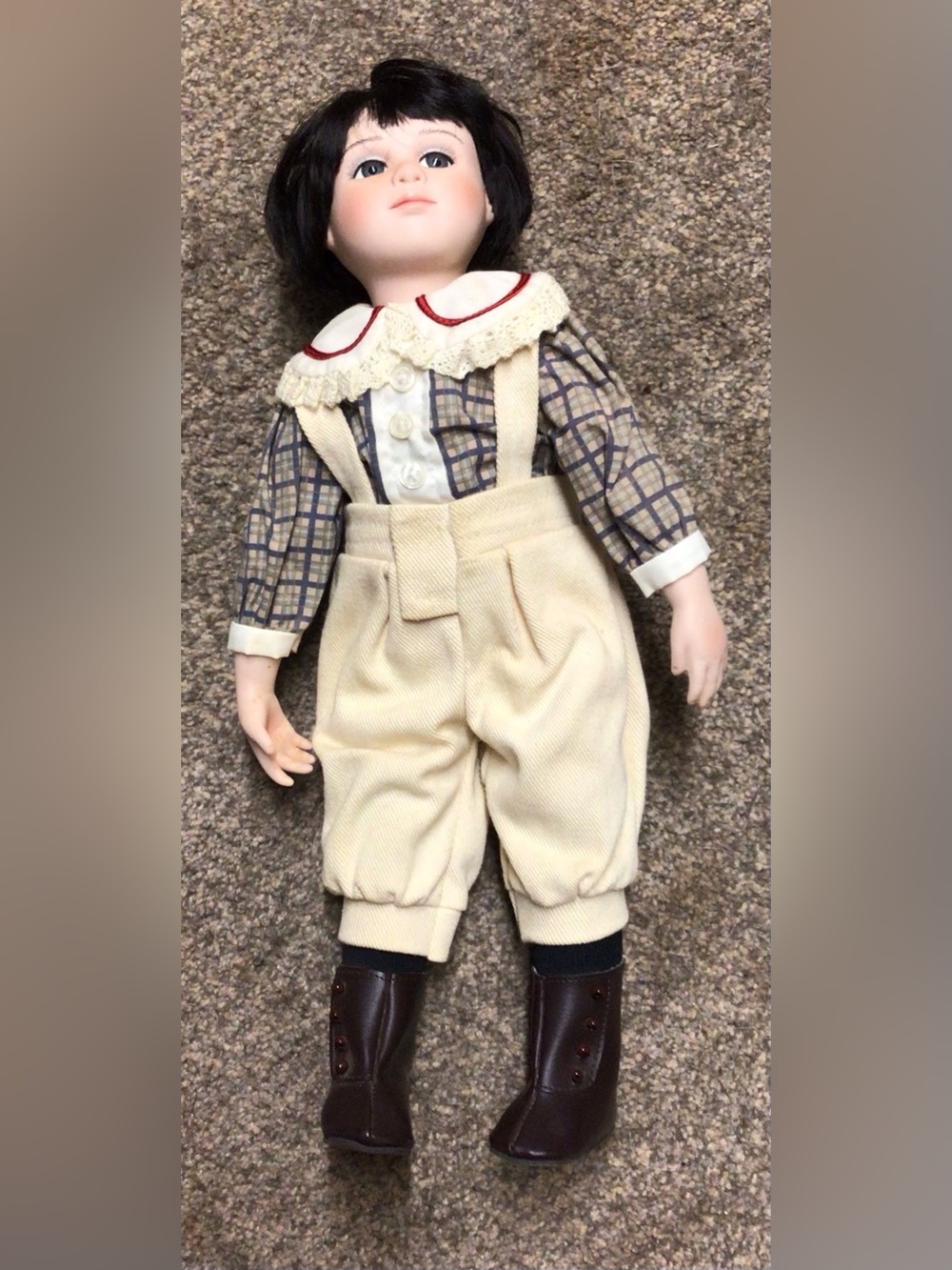 Porcelain boy doll